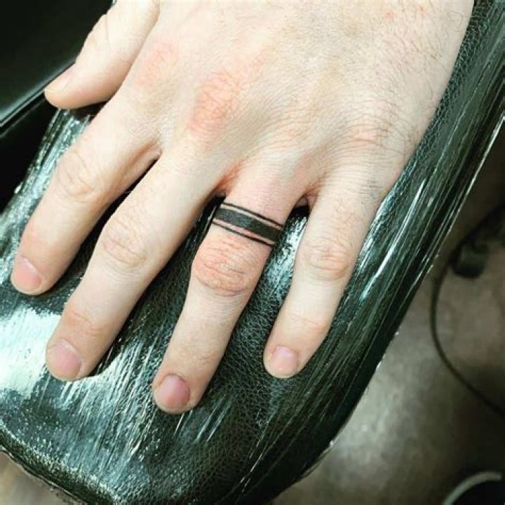 Male Ring Finger Tattoos